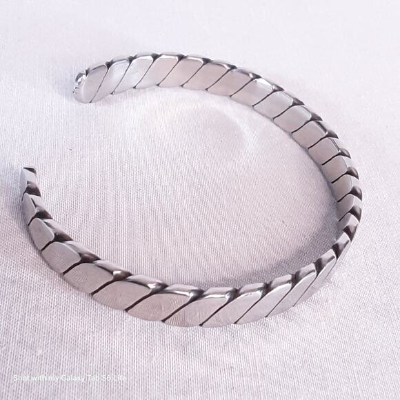 Silver Tone Twisted Cuff Bracelet - Picture 6 of 8